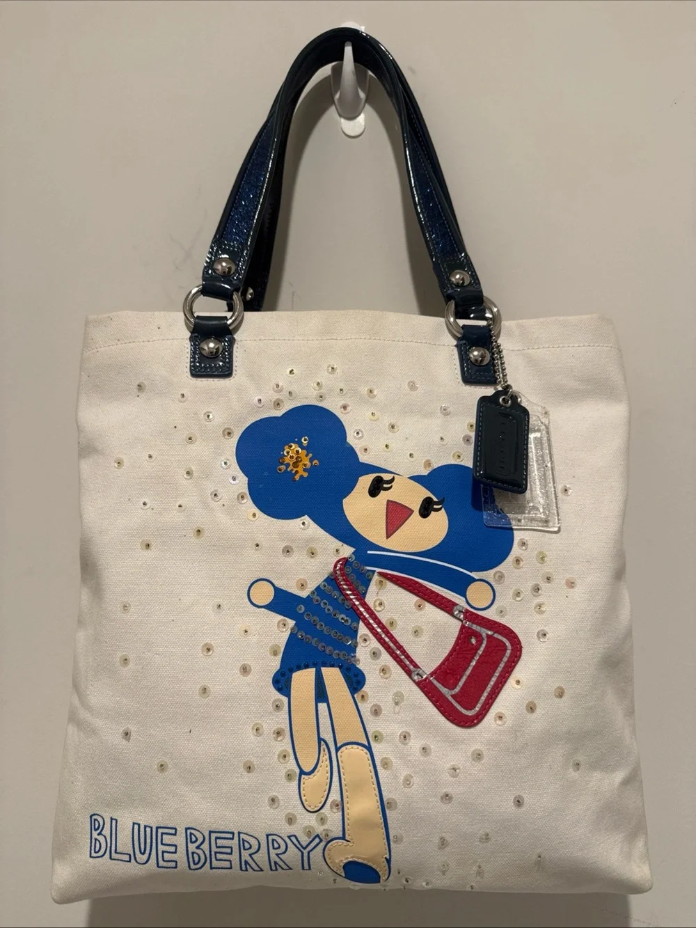 Coach Cream Canvas Tote with Blueberry Print & Navy Handles